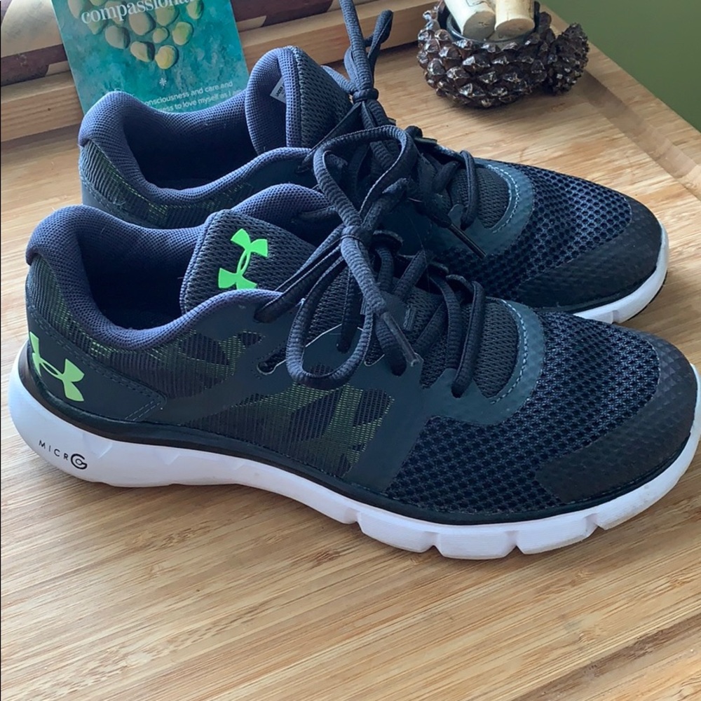 Size 5 Youth Under Armour sneakers. Worn once.